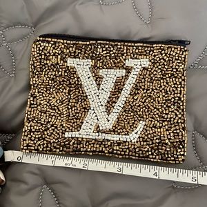 L V beaded change purse